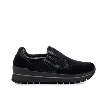 Slip on nera in pelle con suola platform