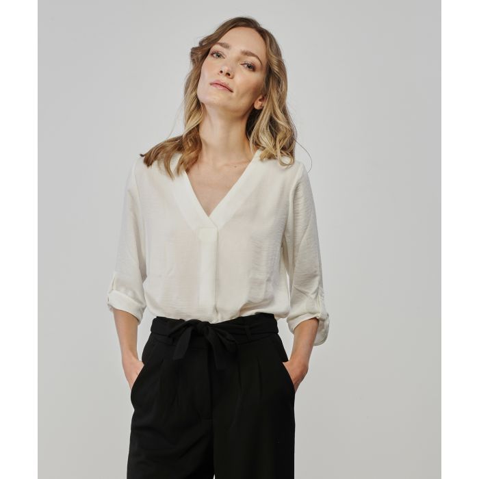Blusa bianca morbida con scollo a V