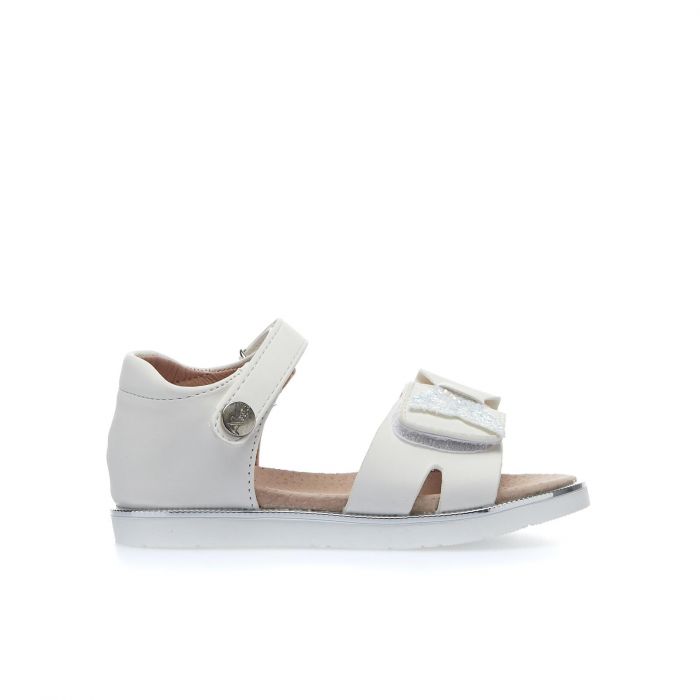 Sandali bianchi con velcro e fiocco glitterato